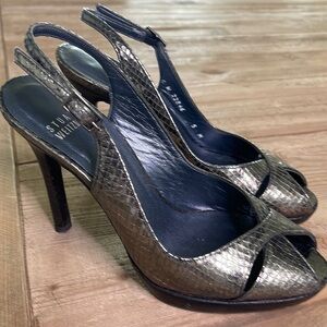 Stuart Weitzman Pewter colored peep toe heels. Size 5